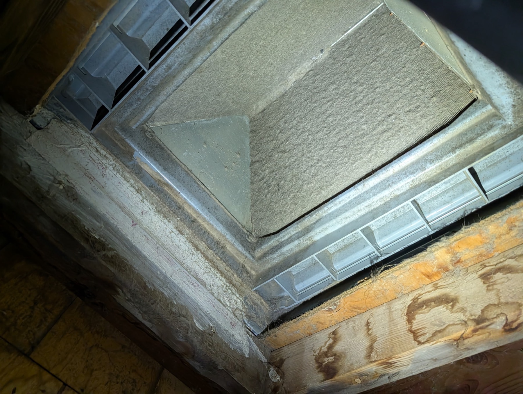 Evaporator coil loaded with dust from inadequate filtration, found during an EZ Heating and Cooling inspection