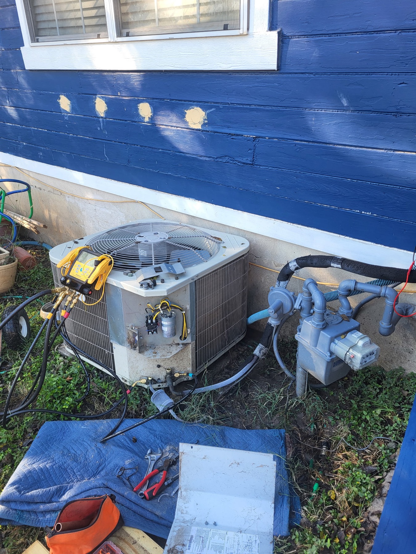 Open furnace cabinet during a repair diagnosis by EZ Heating and Cooling