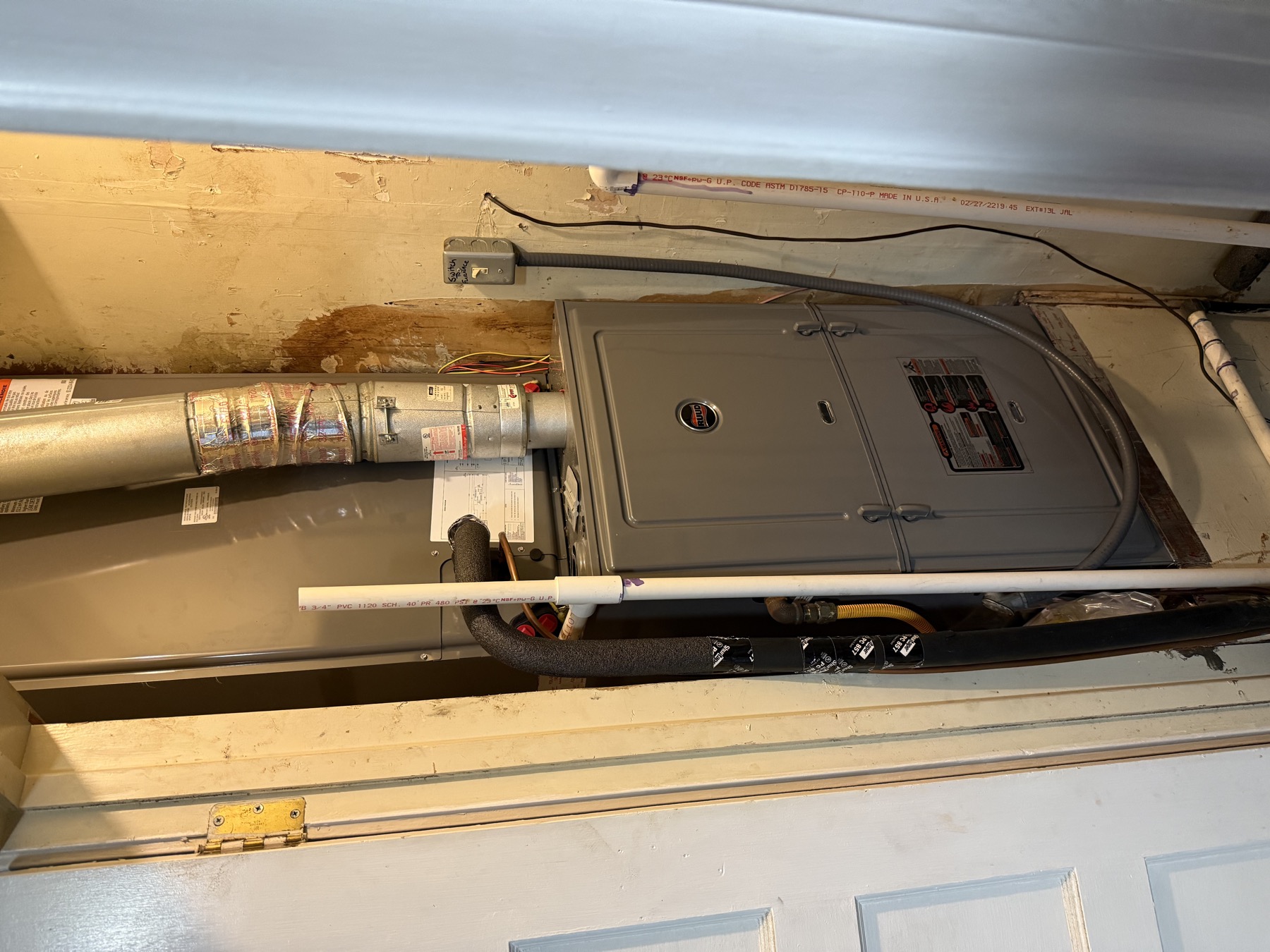 Furnace closet prepared for a whole-home humidifier replacement by EZ Heating and Cooling