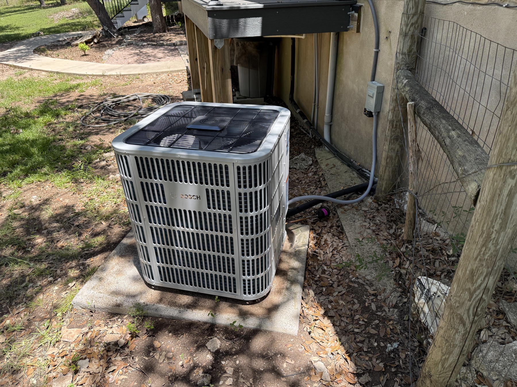 Attic air handler and humidifier connection inspected during a repair visit by EZ Heating and Cooling