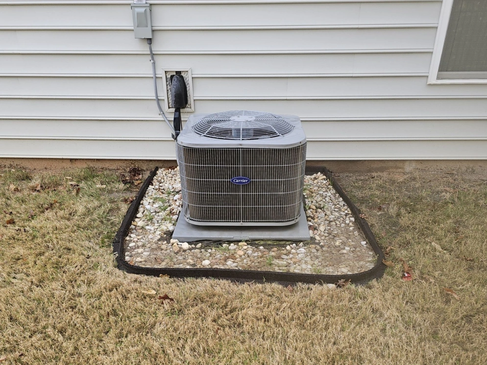 Carrier condenser maintained by EZ Heating and Cooling